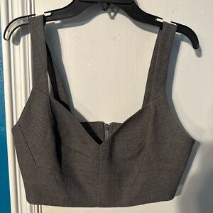 Two Michael Kors bralettes and a crop top